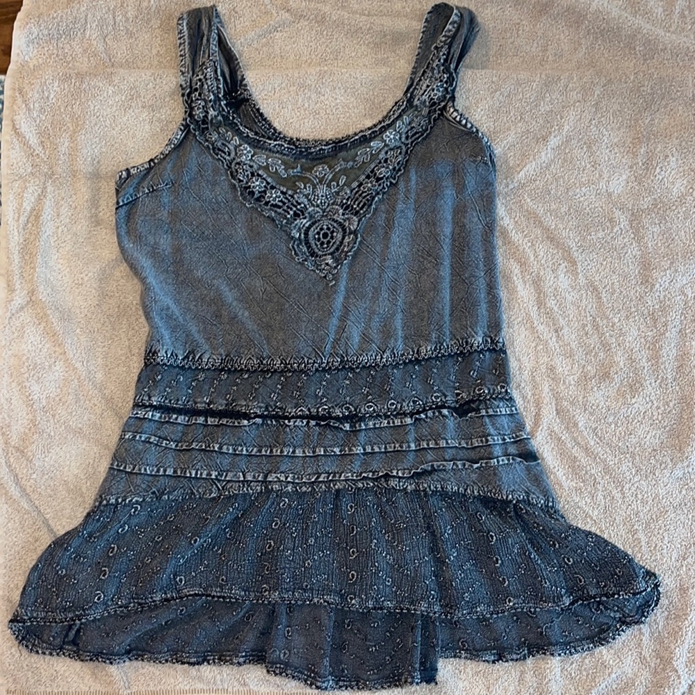 J Lee brand, size M. Fits true to size.